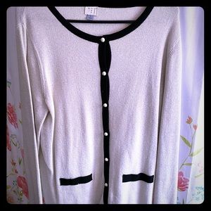 Black and white with a gold hue cardigan.